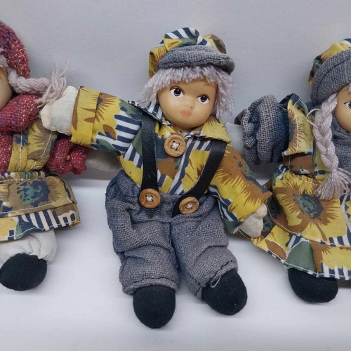 Three small collector dolls with ceramic faces like new