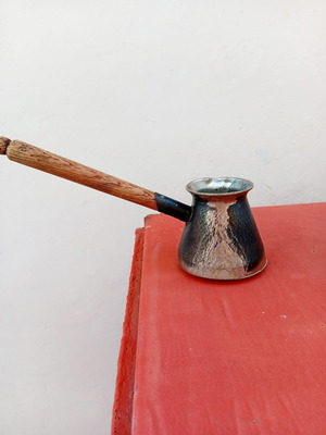 Decorative briki with wooden handle