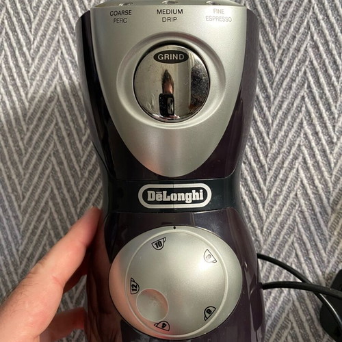 Delonghi coffee grinder like new with base and adapter
