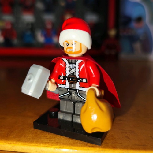 Santa Thor like new with base, red cape, sack, Mjolnir