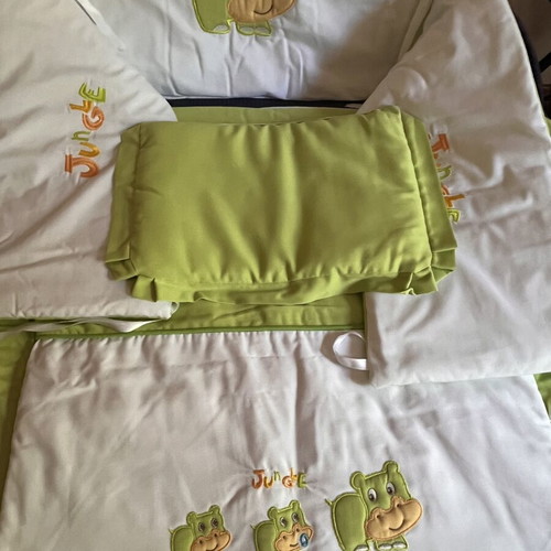 Crib bedding set 3 pieces with green hippopotamus motif, like new