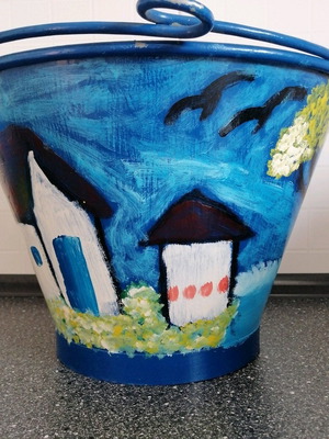 painted metal bucket