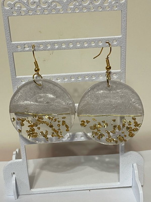 Dangling earrings new with white resin and gold stones