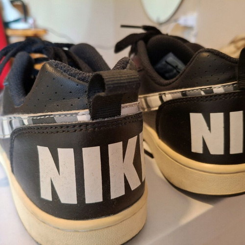Nike low used black athletic shoes size 38.5
