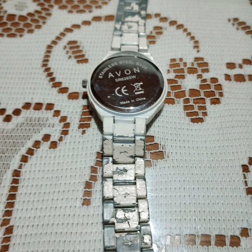 Avon watch used with white strap