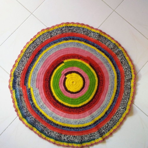 Handmade entrance mat used, diameter 65 cm