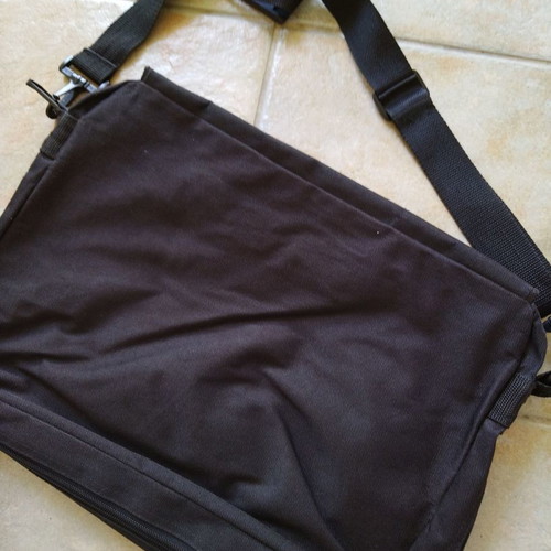 Laptop bag used with repairable damage