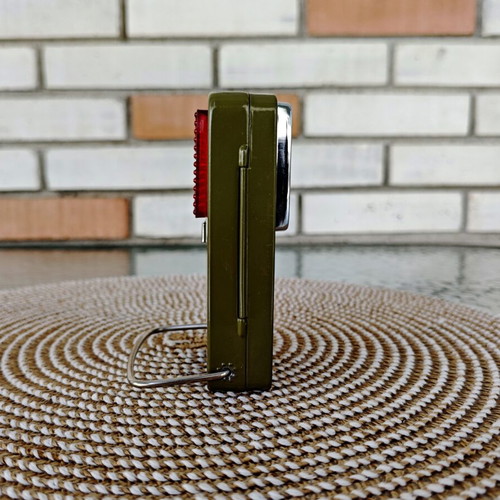 Vintage metal pocket flashlight, khaki