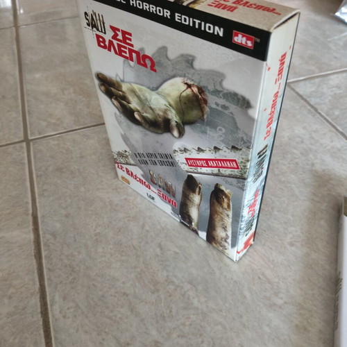 Saw DVD collection like new, 7 movies with Greek subtitles