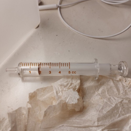 Vintage glass syringe in excellent condition in its box