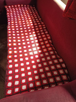 Handmade knitted tapestry used, red and black motifs, 215x75 cm