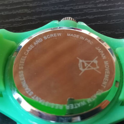 Unisex wristwatch like new, green, battery needed