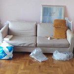Two-seater sofa with cushions