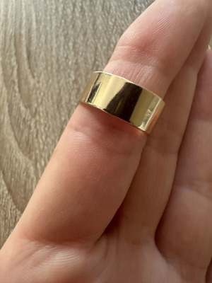 Wide gold-colored adjustable band ring, new