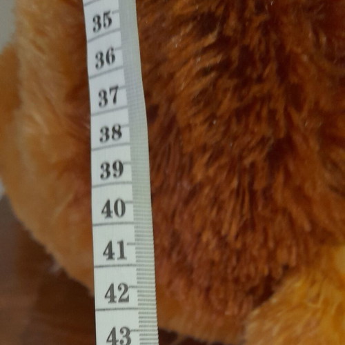 Plush fluffy dog 42 cm sitting new