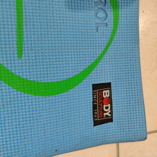 Exercise mat used with visible signs of wear