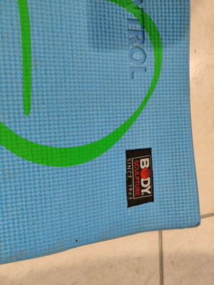 Exercise mat used with visible signs of wear