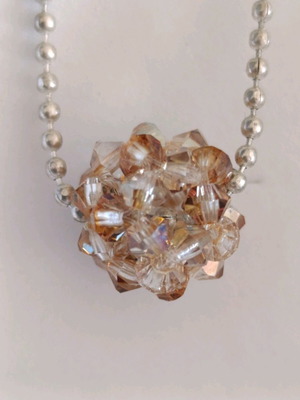 Pendant with crystals like new in warm and rose gold color