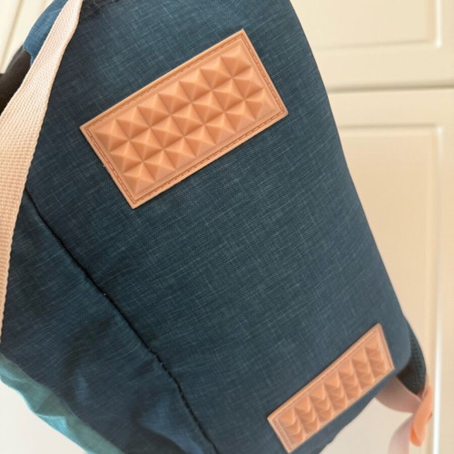 Children's school backpack used with multiple compartments and supportive back