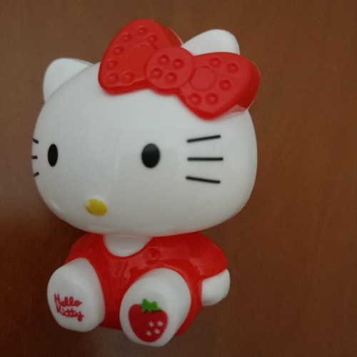 Hello Kitty figure with strawberry like new