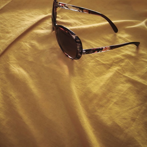 Sunglasses used, brown