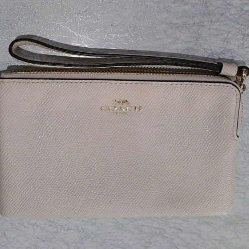 Coach wristlet bag used, beige with strap