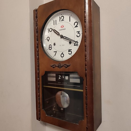 Frontier 31 Day mechanical wooden wall clock with pendulum and calendar like new