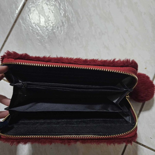 Red fluffy wallet used