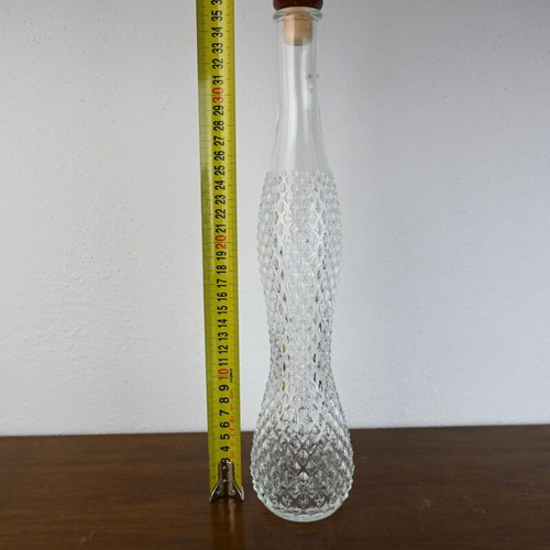 Glass decorative carafe with cork stopper and engraved design like new