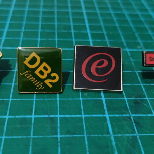 Vintage IBM pins, Oracle pen and Microsoft Office cap used