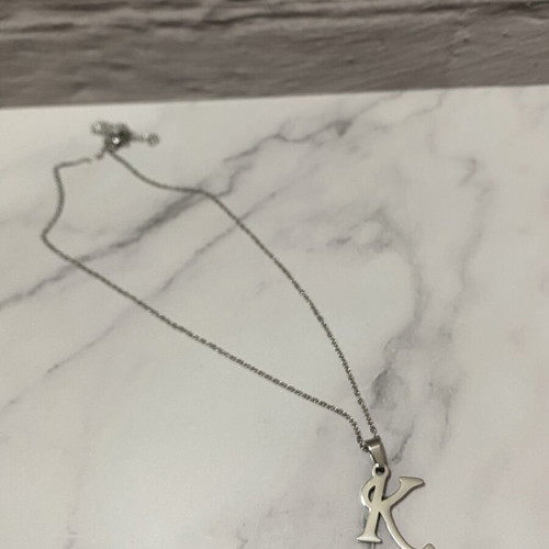 Monogram Necklace like new, silver color