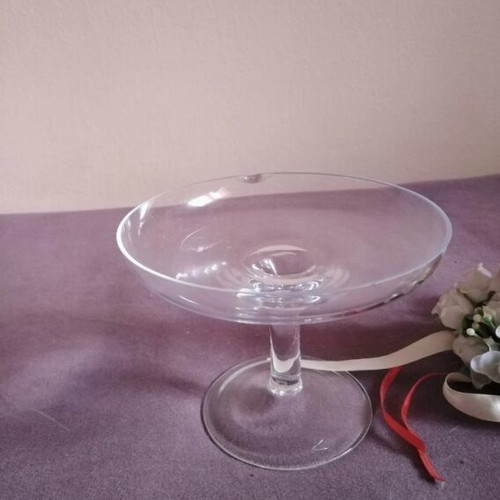 Glass candlestick with wreath and two-tone candle used