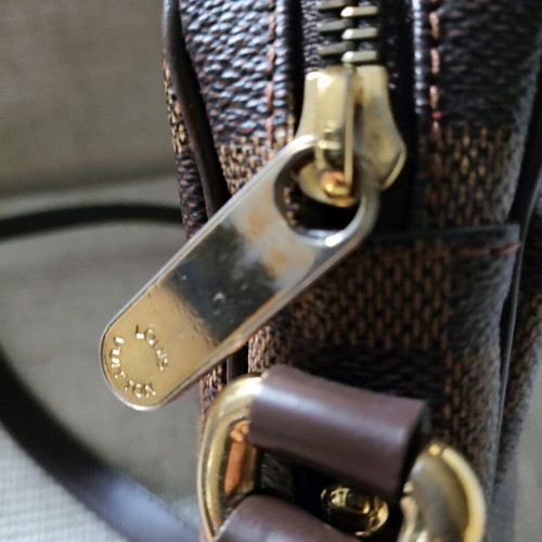 Louis Vuitton Damier Ebene Rift crossbody bag like new, brown