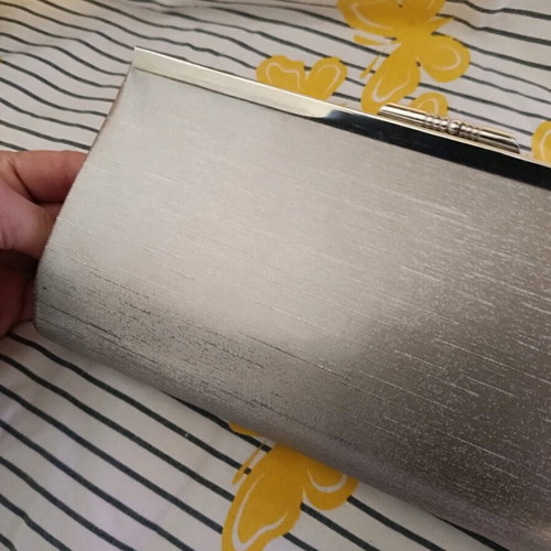 Clutch bag like new, silver