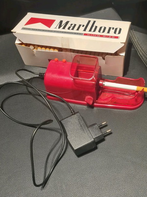 Уред за пълнене на цигари с празни цигари и филтър