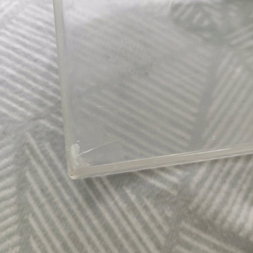 Plastic tissue box used, slightly cracked