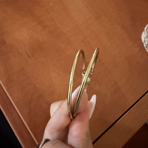 Gold color faux earrings used, slightly faded