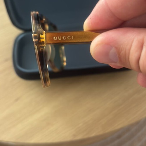 Gucci women's sunglasses, gold color