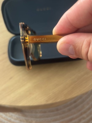 Gucci women's sunglasses, gold color