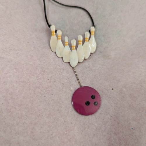 Bowling necklace like new, silver and enamel