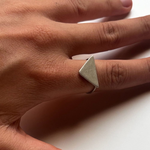 Triangular brass ring like new with thin band and textured finish