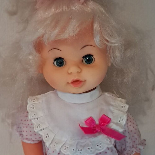 Vintage Anna doll with yo-yo in hand used