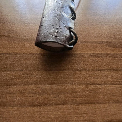 Hanging lighter case like new, carved design