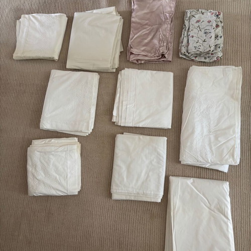 Set of embroidered cotton bed sheets, pillowcases and duvet covers