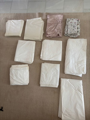 Set of embroidered cotton bed sheets, pillowcases and duvet covers