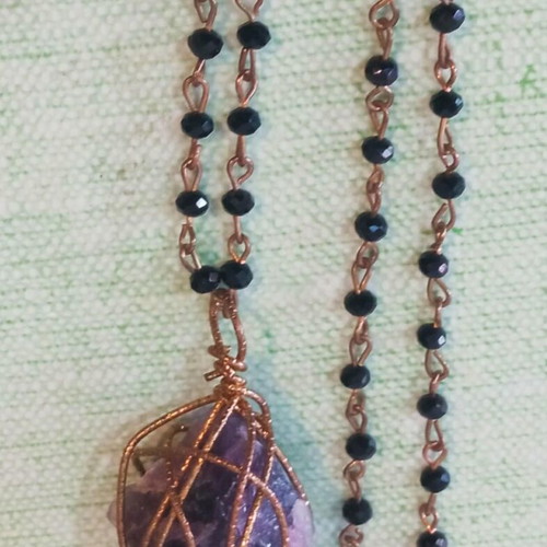 Pendant with amethyst wire-wrapped in copper and long rosary chain like new