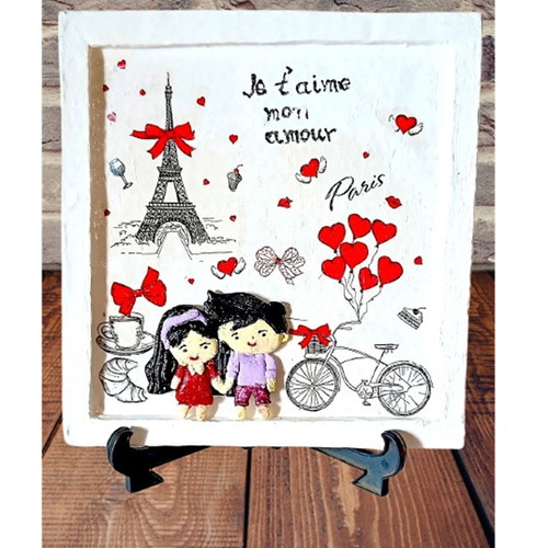 Handmade Saint Valentine frame with loving couple in Paris, new