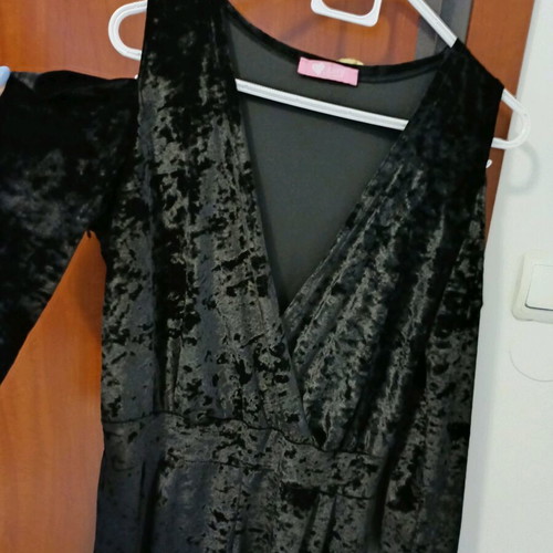 Black velvet jumpsuit like new with deep neckline and off-shoulder design