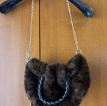 Small furry handbag with chain, black and brown