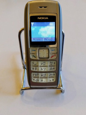 Nokia 1600 used mobile phone silver with two batteries